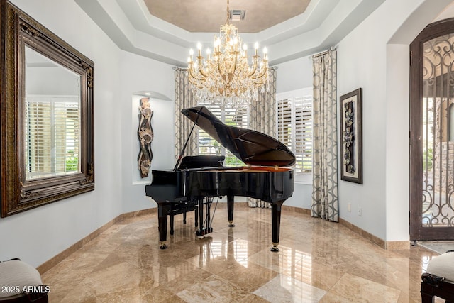 4328 N Pinnacle Ridge Cir, Mesa, AZ 85207 - sitting room featuring a raised ceiling, arched walkways, a chandelier, and baseboards