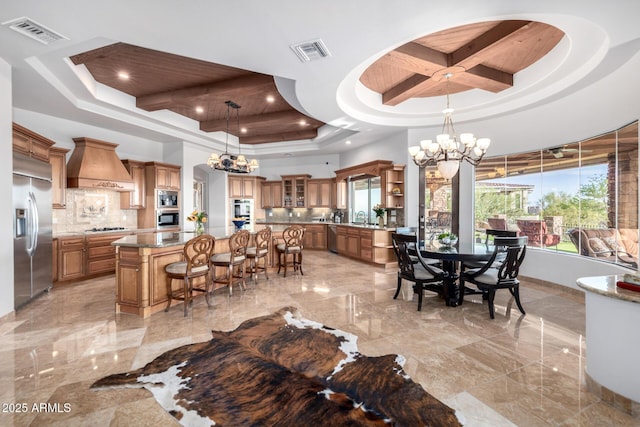 4328 N Pinnacle Ridge Cir, Mesa, AZ 85207 - dining room featuring a raised ceiling, a chandelier, recessed lighting, and light marble finish floors
