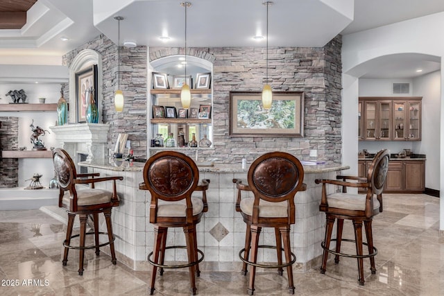 4328 N Pinnacle Ridge Cir, Mesa, AZ 85207 - indoor wet bar with arched walkways, light marble finish floors, and hanging light fixtures