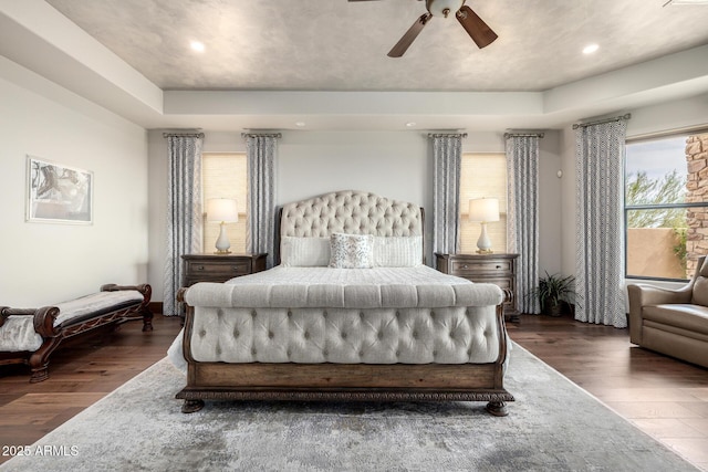 4328 N Pinnacle Ridge Cir, Mesa, AZ 85207 - bedroom with wood finished floors, a tray ceiling, ceiling fan, and recessed lighting