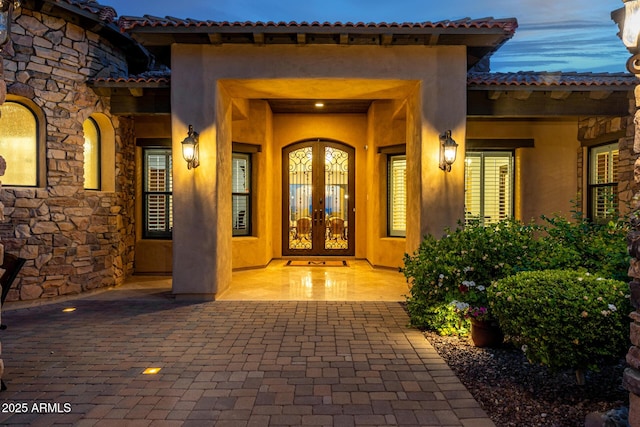 4328 N Pinnacle Ridge Cir, Mesa, AZ 85207 - doorway to property with stone siding, stucco siding, french doors, and a tile roof