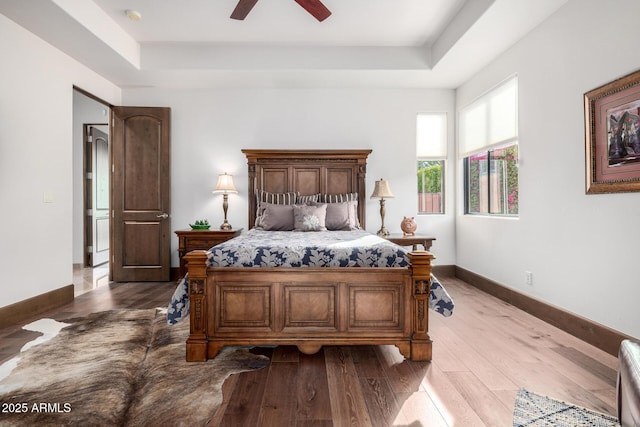 4328 N Pinnacle Ridge Cir, Mesa, AZ 85207 - bedroom with a raised ceiling, dark wood-type flooring, and baseboards