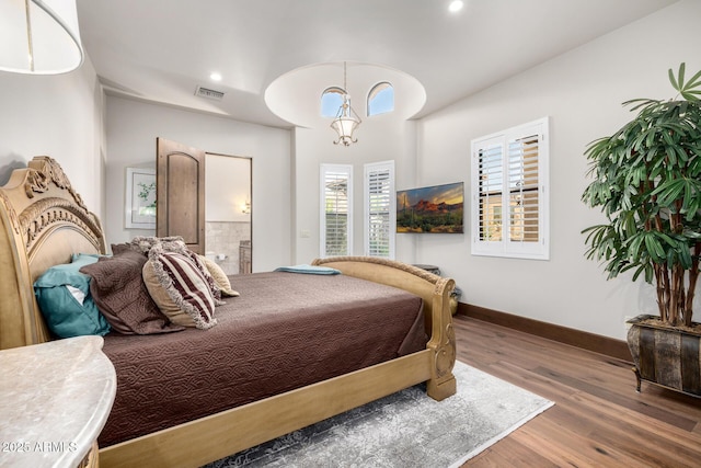 4328 N Pinnacle Ridge Cir, Mesa, AZ 85207 - bedroom featuring wood finished floors, baseboards, recessed lighting, and ensuite bath