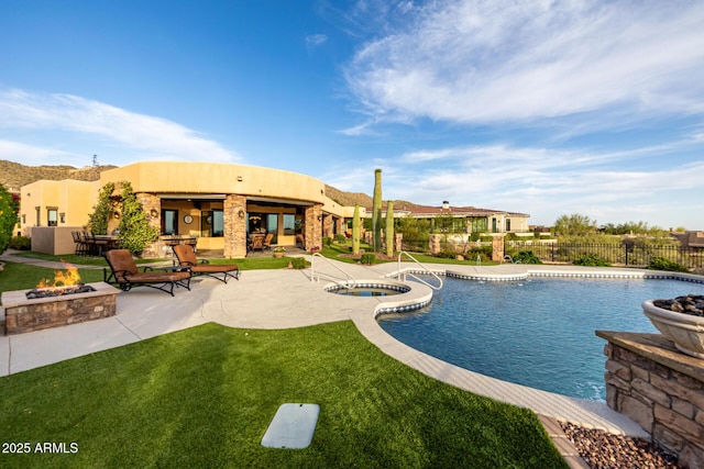 4328 N Pinnacle Ridge Cir, Mesa, AZ 85207 - view of pool with a fire pit, a patio, and an in-ground hot tub