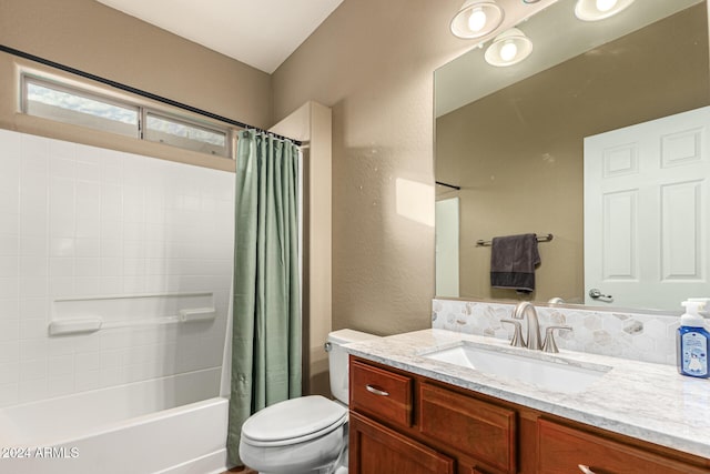 full bathroom featuring vanity, toilet, and shower / bathtub combination with curtain