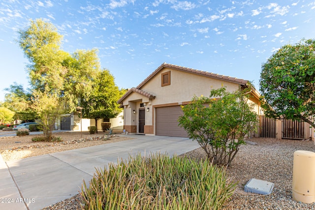 view of front of home with a garage