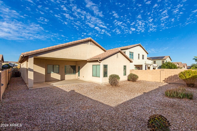 rear view of property with a patio