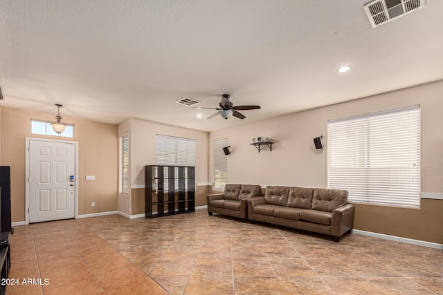 living room with ceiling fan