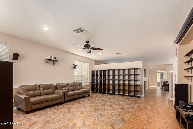 living room with ceiling fan