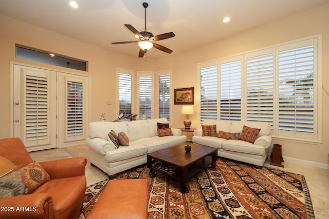 tiled living room with baseboards, a ceiling fan, and recessed lighting