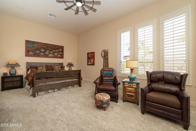 bedroom featuring carpet, visible vents, ceiling fan, and baseboards