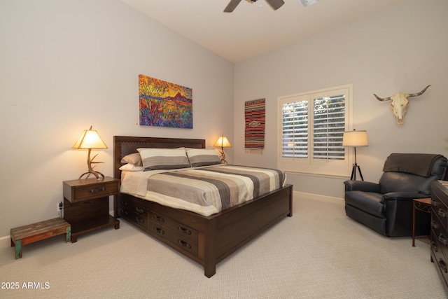 carpeted bedroom featuring ceiling fan, visible vents, and baseboards