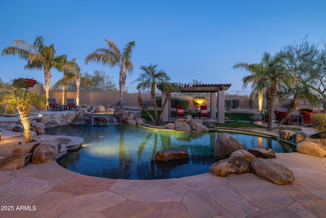 view of swimming pool with fence, a fenced in pool, and a patio