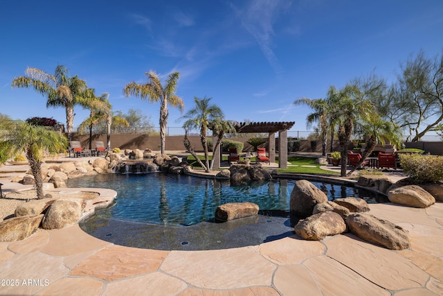 outdoor pool featuring a patio area and a pergola