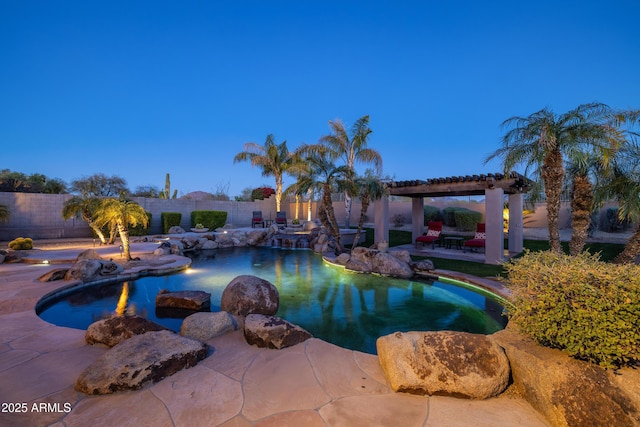 view of swimming pool featuring a patio area, a fenced backyard, and a fenced in pool