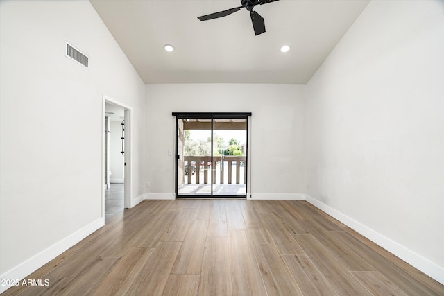 4434 E Camelback Rd Unit 132, Phoenix, AZ 85018 - unfurnished room with ceiling fan, wood finished floors, and recessed lighting