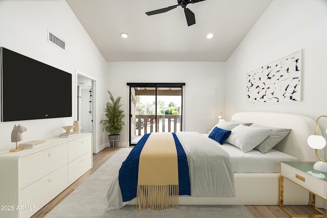 4434 E Camelback Rd Unit 132, Phoenix, AZ 85018 - bedroom with access to exterior, light wood-type flooring, lofted ceiling, a ceiling fan, and recessed lighting