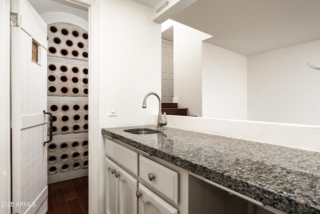 4434 E Camelback Rd Unit 132, Phoenix, AZ 85018 - bathroom featuring vanity and wood finished floors