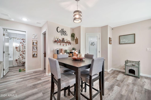 dining area featuring light hardwood / wood-style floors