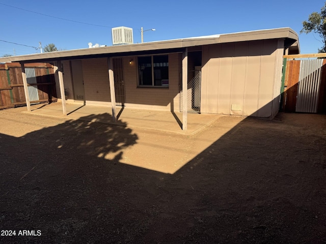 back of property featuring a patio