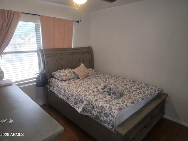 11770 W Aster Dr, El Mirage, AZ 85335 - bedroom with dark wood-type flooring and baseboards