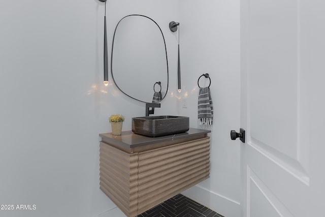 bathroom with tile patterned flooring and vanity