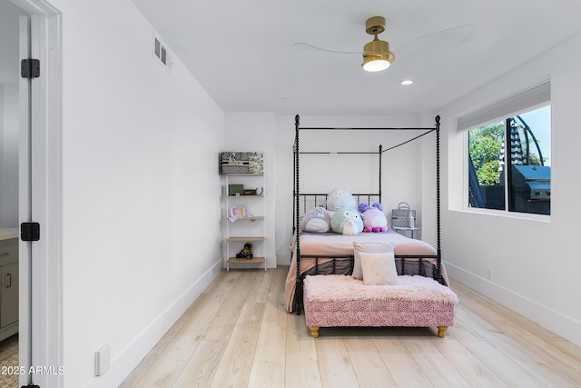 bedroom featuring light wood finished floors, baseboards, visible vents, and recessed lighting