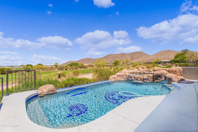 outdoor pool featuring a mountain view