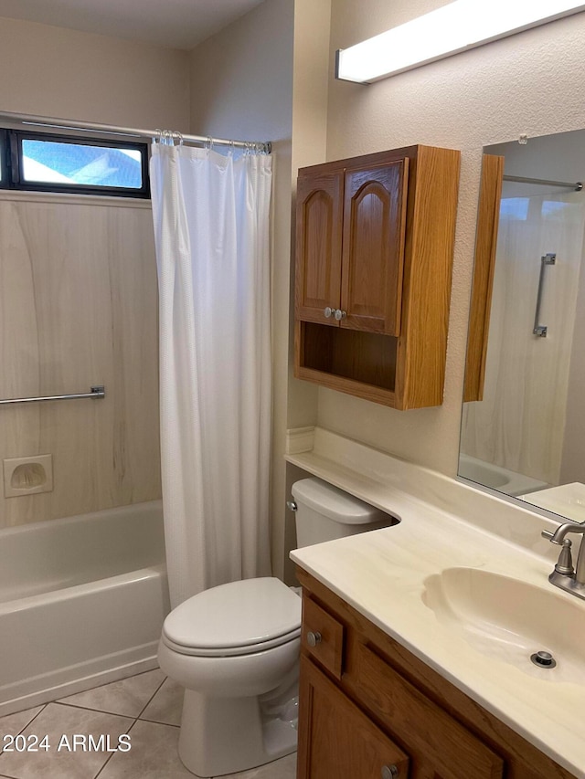 full bathroom with shower / bath combo, tile patterned flooring, vanity, and toilet