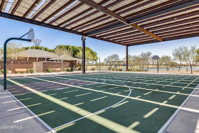 view of community featuring basketball hoop