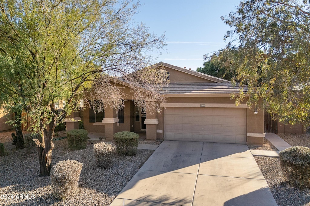 view of front of property with a garage