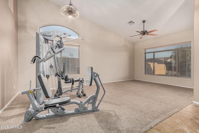 workout area with visible vents, baseboards, carpet, ceiling fan with notable chandelier, and lofted ceiling
