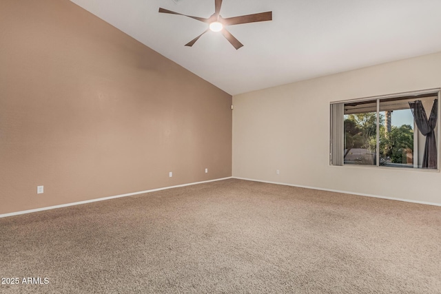 unfurnished room featuring carpet, baseboards, lofted ceiling, and ceiling fan