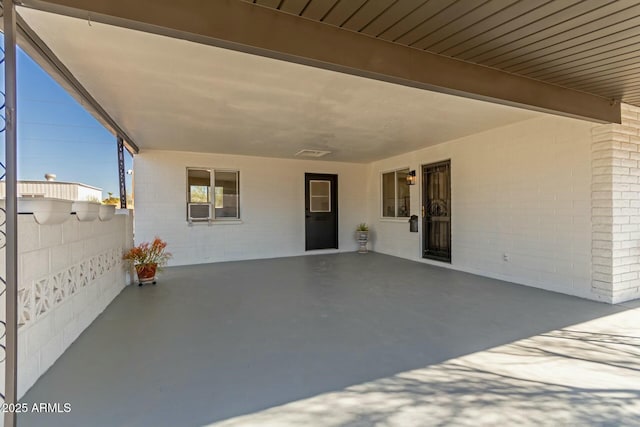 view of patio / terrace featuring fence