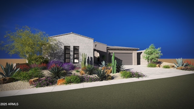 contemporary home featuring an attached garage and decorative driveway