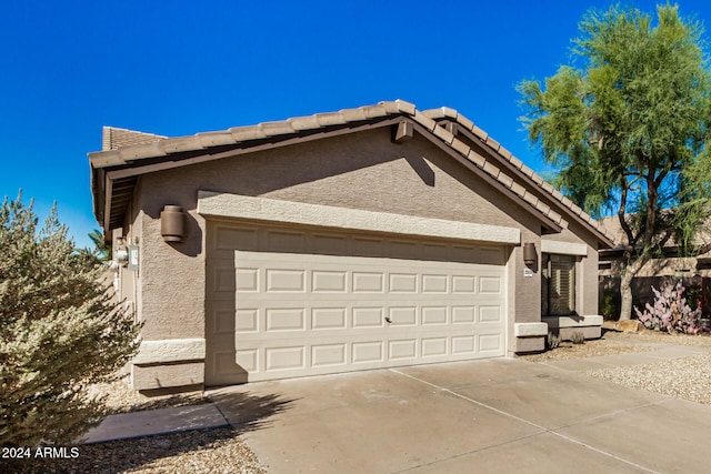 exterior space featuring a garage