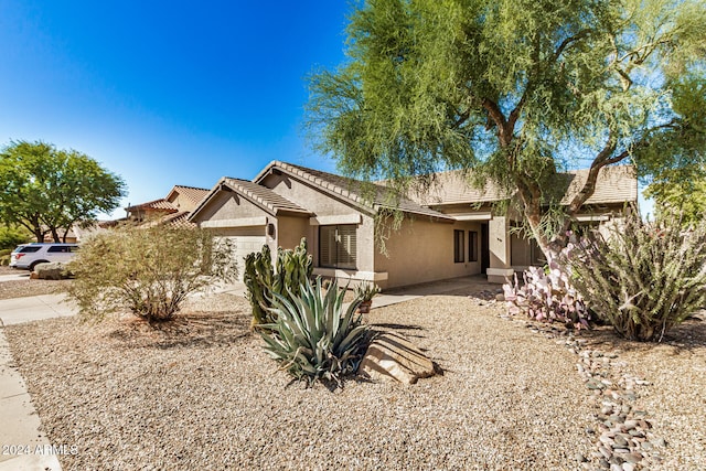 view of front of property with a garage