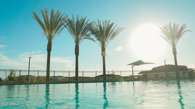view of water feature with fence