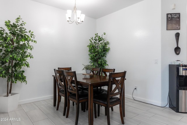 dining room featuring a chandelier