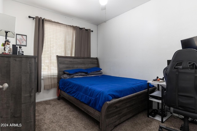 bedroom with ceiling fan and carpet