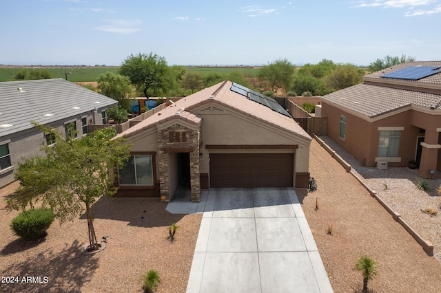 view of front of property featuring a garage