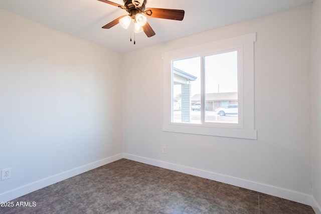 8021 W Hazelwood St, Phoenix, AZ 85033 - unfurnished room with baseboards and a ceiling fan