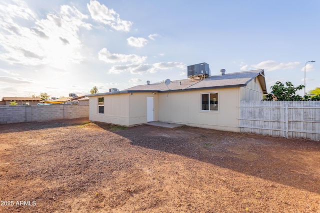 8021 W Hazelwood St, Phoenix, AZ 85033 - back of house featuring central air condition unit and a fenced backyard