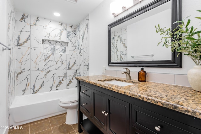 8021 W Hazelwood St, Phoenix, AZ 85033 - full bathroom featuring toilet, vanity, tile patterned floors, and tub / shower combination