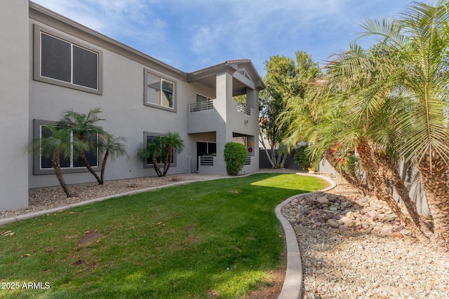 exterior space featuring a front yard