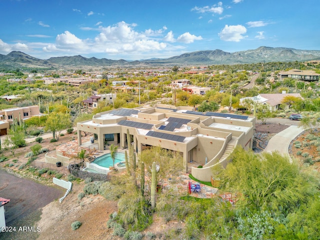 bird's eye view with a mountain view