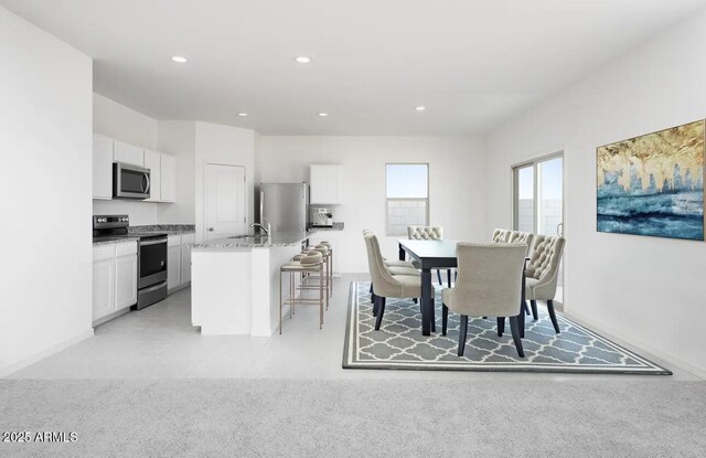 47204 W Coe St, Maricopa, AZ 85139 - dining area featuring recessed lighting and light colored carpet