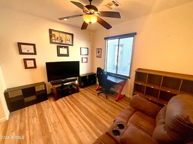 office with ceiling fan and light wood-type flooring