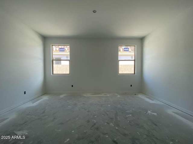 empty room featuring a wealth of natural light