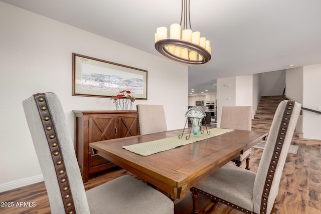 7247 W Buckskin Trl, Peoria, AZ 85383 - dining room featuring wood finished floors, stairs, and recessed lighting